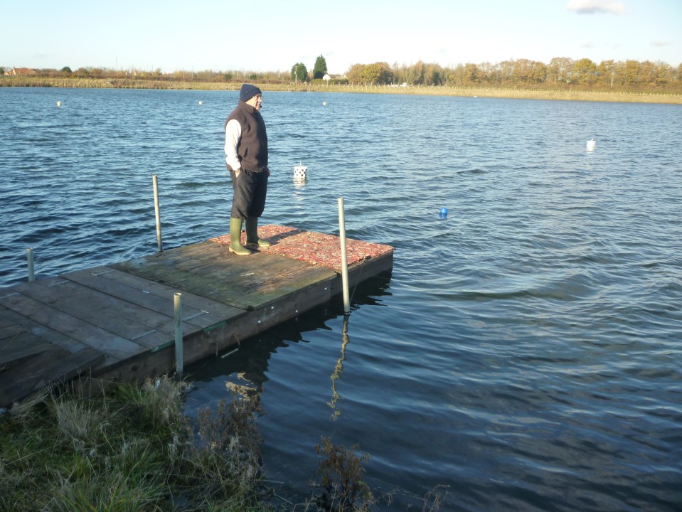 Gordon casting an eye over the lake P1030263